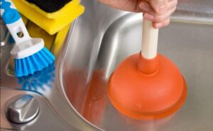 Lave Vaisselle Bouché : 5 Raisons Fréquentes (et comment réparer)